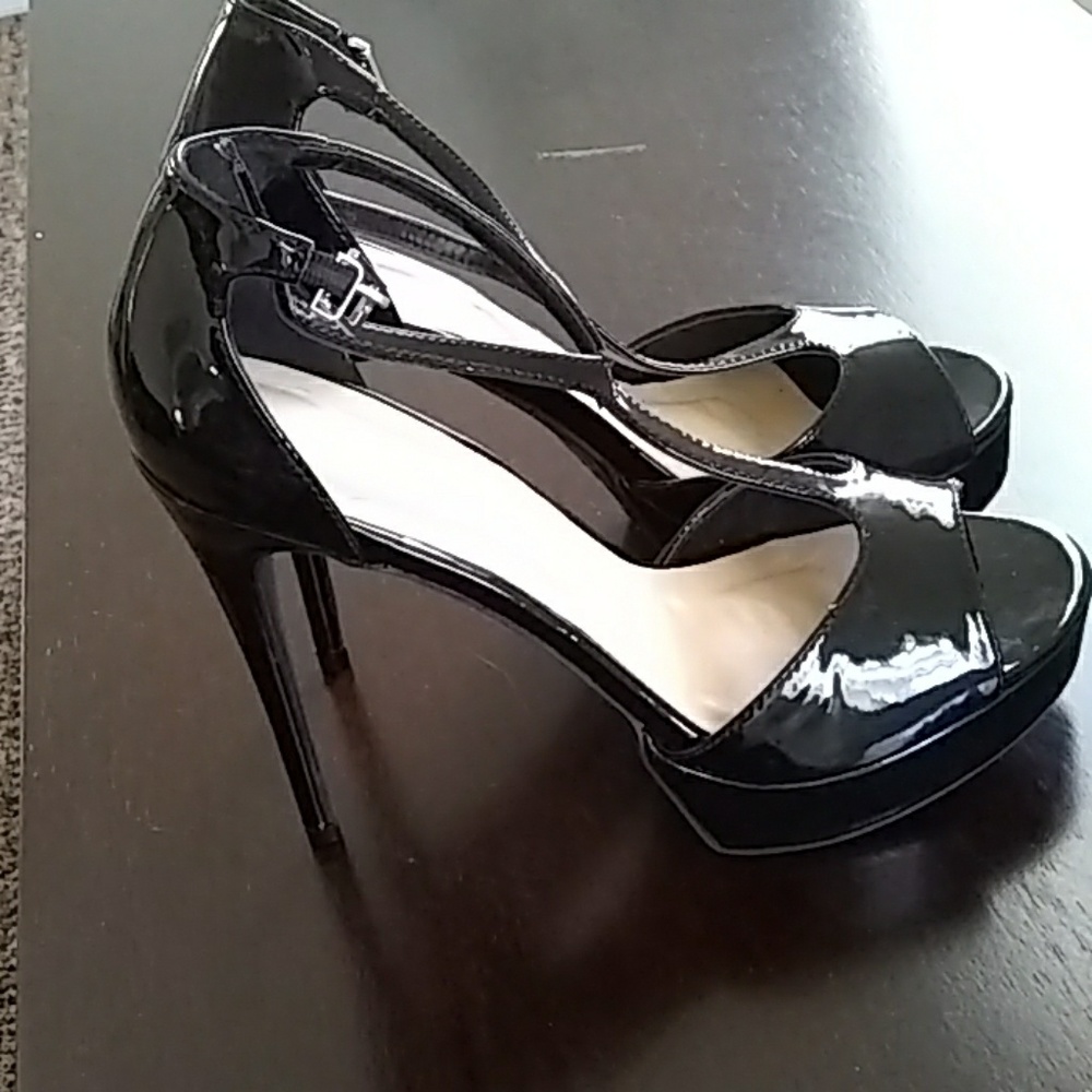 Black Patent High open toe Heel with ankle strap.